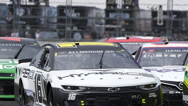 Aug 15, 2021; Speedway, Indiana, USA; NASCAR Cup Series driver AJ Allmendinger (16) during the Verizon 200 at the Brickyard at Indianapolis Motor Speedway Road Course. Mandatory Credit: Mike Dinovo-USA TODAY Sports