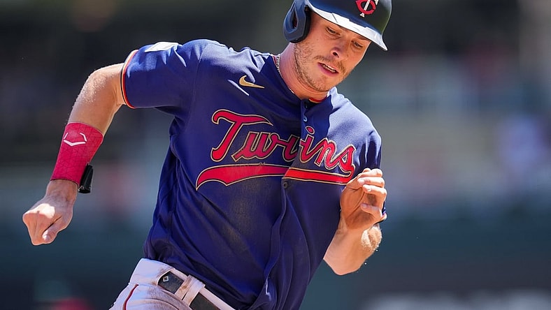 Aug 15, 2021; Minneapolis, Minnesota, USA; Minnesota Twins right fielder Max Kepler (26) rounds third and scores against the Tampa Bay Rays in the first inning at Target Field. Mandatory Credit: Brad Rempel-USA TODAY Sports