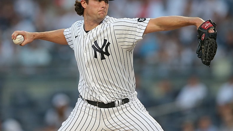Aug 16, 2021; Bronx, New York, USA; New York Yankees starting pitcher Gerrit Cole (45) throws a pitch against the Los Angeles Angels during the first inning at Yankee Stadium. Mandatory Credit: Brad Penner-USA TODAY Sports