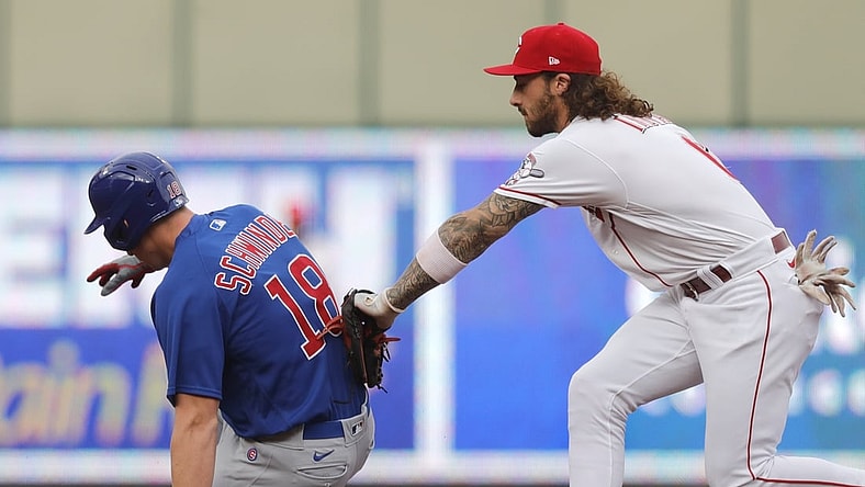 Aug 16, 2021; Cincinnati, Ohio, USA; Chicago Cubs first baseman Frank Schwindel (18) slide into second for a double against Cincinnati Reds second baseman Jonathan India (6) during the first inning at Great American Ball Park. Mandatory Credit: David Kohl-USA TODAY Sports