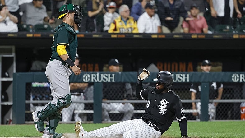 Aug 16, 2021; Chicago, Illinois, USA; Chicago White Sox center fielder Luis Robert (88) scores against the Oakland Athletics during the fourth inning at Guaranteed Rate Field. Mandatory Credit: Kamil Krzaczynski-USA TODAY Sports
