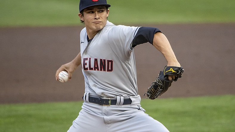Aug 17, 2021; Minneapolis, Minnesota, USA; Cleveland Indians starting pitcher Eli Morgan (49) delivers a pitch in the first inning against the Minnesota Twins at Target Field. Mandatory Credit: Jesse Johnson-USA TODAY Sports