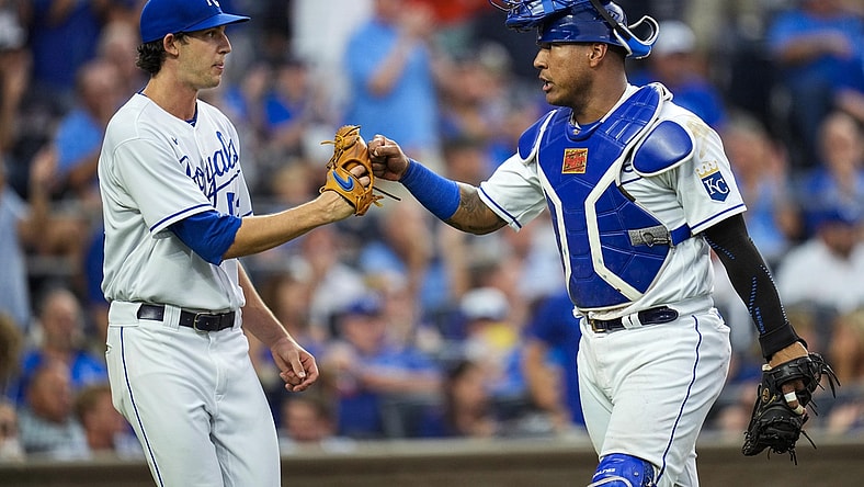 Aug 17, 2021; Kansas City, Missouri, USA; Kansas City Royals starting pitcher Daniel Lynch (52) celebrates with Kansas City Royals catcher Salvador Perez (13) after the third inning against the Houston Astros at Kauffman Stadium. Mandatory Credit: Jay Biggerstaff-USA TODAY Sports
