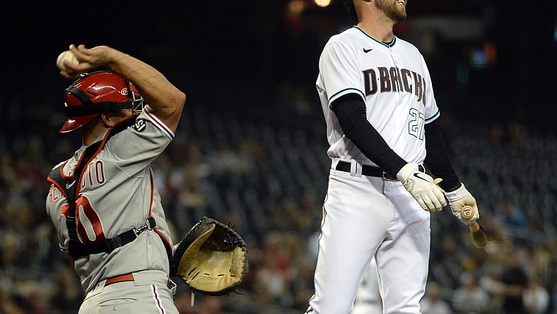 Aug 17, 2021; Phoenix, Arizona, USA; Arizona Diamondbacks pinch hitter Drew Ellis (27) reacts after striking out against the Philadelphia Phillies during the fifth inning at Chase Field. Mandatory Credit: Joe Camporeale-USA TODAY Sports