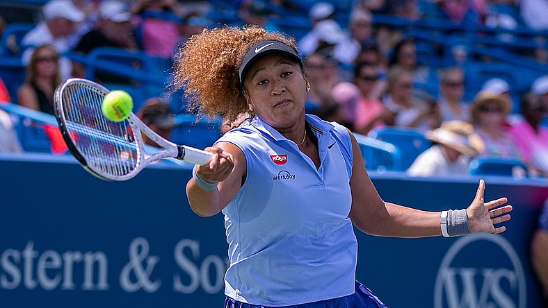 Naomi Osaka of Japan makes a hit to Cori Gauff of the United States during the Western & Southern Open at the Lindner Family Tennis Center Wednesday, August 18, 2021.

Naomi Coco4
