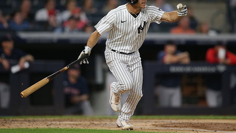 Aug 18, 2021; Bronx, New York, USA; New York Yankees shortstop Andrew Velazquez (71) follows through on an RBI single against the Boston Red Sox during the second inning at Yankee Stadium. Mandatory Credit: Brad Penner-USA TODAY Sports
