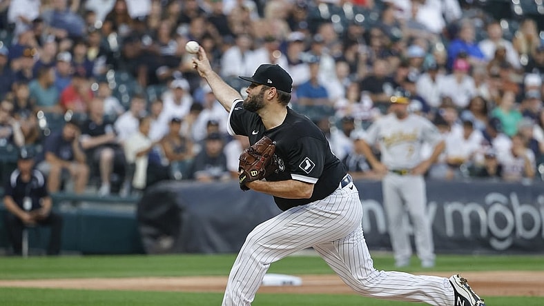Aug 18, 2021; Chicago, Illinois, USA; Chicago White Sox starting pitcher Lance Lynn (33) delivers against the Oakland Athletics during the first inning at Guaranteed Rate Field. Mandatory Credit: Kamil Krzaczynski-USA TODAY Sports