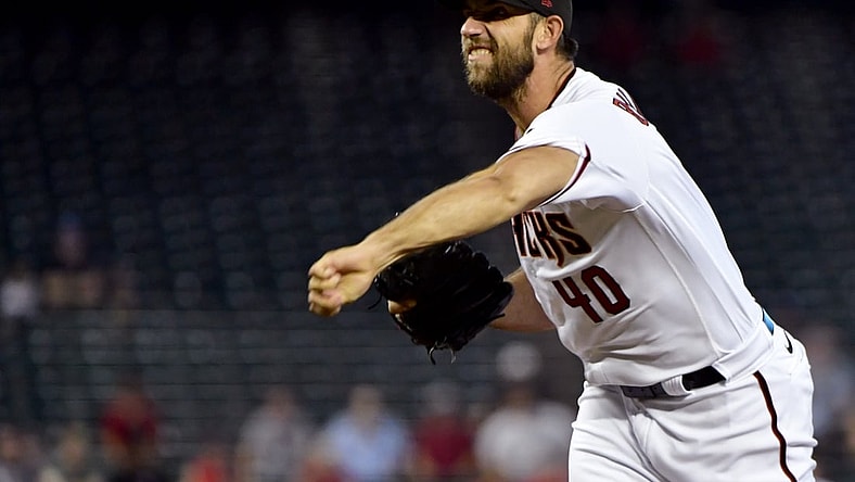 Aug 19, 2021; Phoenix, Arizona, USA;  Arizona Diamondbacks starting pitcher Madison Bumgarner (40) throws inn the first inning against the Philadelphia Phillies at Chase Field. Mandatory Credit: Matt Kartozian-USA TODAY Sports
