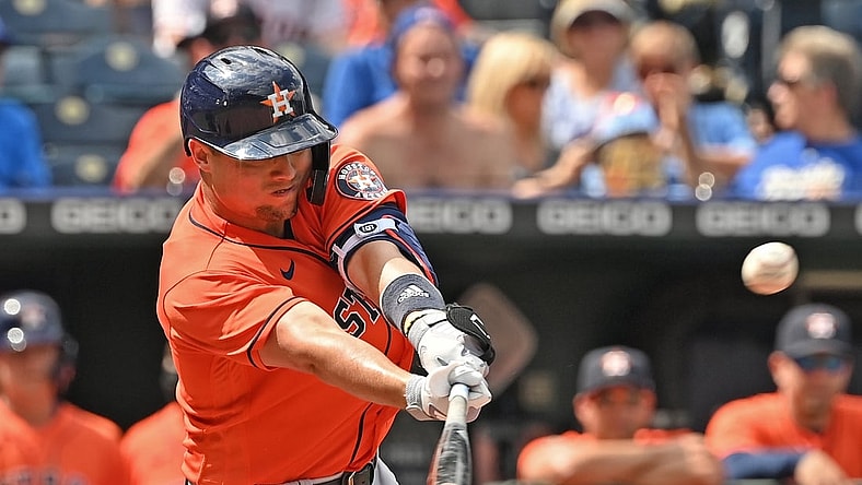 Aug 19, 2021; Kansas City, Missouri, USA;  Houston Astros left fielder Aledmys Diaz (16) hits a RBI double during the sixth inning against the Kansas City Royals at Kauffman Stadium. Mandatory Credit: Peter Aiken-USA TODAY Sports