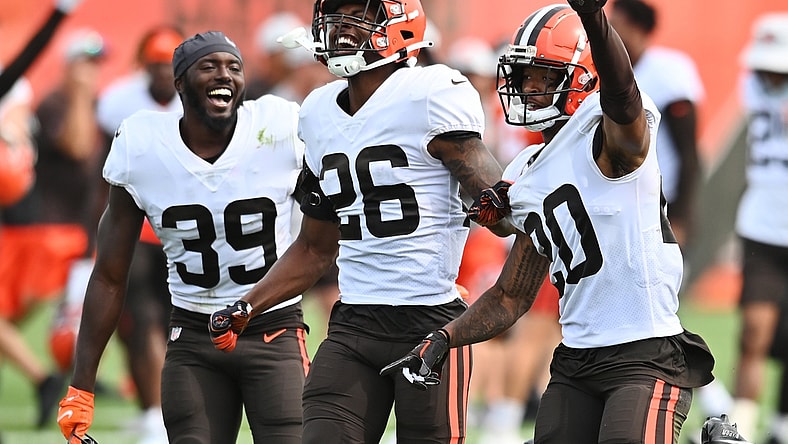 Aug 19, 2021; Berea, OH, USA; Cleveland Browns cornerback Greg Newsome II (20) celebrates with safety Richard LeCounte III (39) and cornerback Greedy Williams (26) after intercepting a pass during a joint practice with the New York Giants at CrossCountry Mortgage Campus. Mandatory Credit: Ken Blaze-USA TODAY Sports