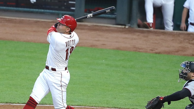 Aug 19, 2021; Cincinnati, Ohio, USA; Cincinnati Reds first baseman Joey Votto (19) hits a three-run home run against the Miami Marlins during the fourth inning at Great American Ball Park. Mandatory Credit: David Kohl-USA TODAY Sports