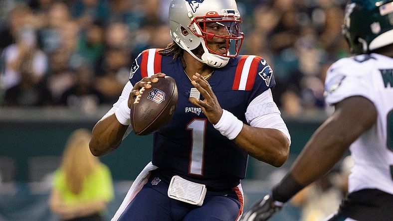 Aug 19, 2021; Philadelphia, Pennsylvania, USA; New England Patriots quarterback Cam Newton (1) drops back to pass against the Philadelphia Eagles during the first quarter at Lincoln Financial Field. Mandatory Credit: Bill Streicher-USA TODAY Sports