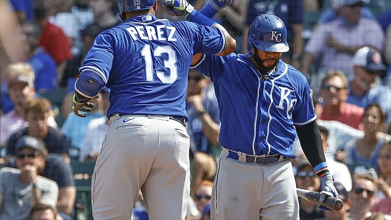 Aug 20, 2021; Chicago, Illinois, USA; Kansas City Royals catcher Salvador Perez (13) celebrates with first baseman Carlos Santana (41) after hitting a solo home run against the Chicago Cubs during the sixth inning at Wrigley Field. Mandatory Credit: Kamil Krzaczynski-USA TODAY Sports