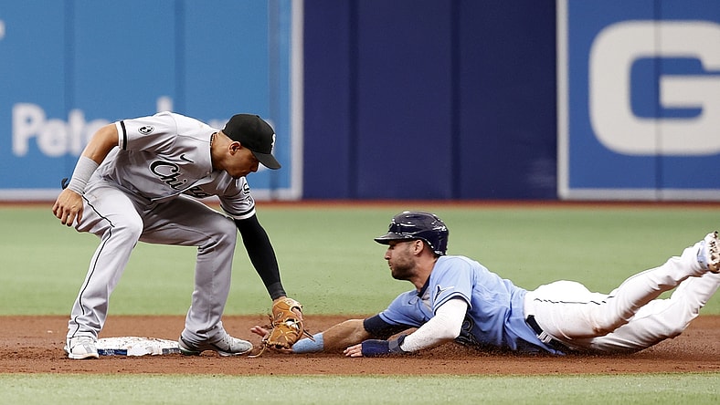 Aug 22, 2021; St. Petersburg, Florida, USA; Chicago White Sox second baseman Cesar Hernandez (12) tags to Tampa Bay Rays center fielder Kevin Kiermaier (39) as he attempted to steal second base during the third inning at Tropicana Field. Mandatory Credit: Kim Klement-USA TODAY Sports