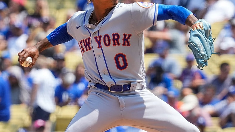 Aug 22, 2021; Los Angeles, California, USA; New York Mets starting pitcher Marcus Stroman (0) throws a pitch in the first inning against the Los Angeles Dodgers at Dodger Stadium. Mandatory Credit: Robert Hanashiro-USA TODAY Sports