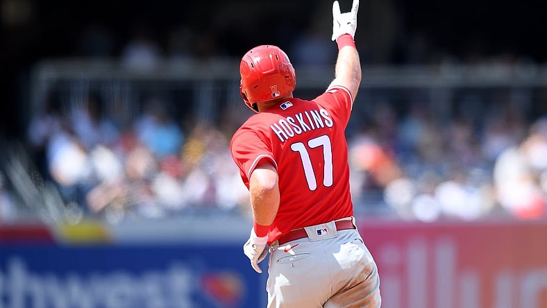 Aug 22, 2021; San Diego, California, USA; Philadelphia Phillies first baseman Rhys Hoskins (17) gestures as he rounds the bases after hitting a home run against the San Diego Padres during the fifth inning at Petco Park. Mandatory Credit: Orlando Ramirez-USA TODAY Sports