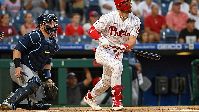 Aug 24, 2021; Philadelphia, Pennsylvania, USA; Philadelphia Phillies right fielder Bryce Harper (3) hits a single against the Tampa Bay Rays during the first inning at Citizens Bank Park. Mandatory Credit: Eric Hartline-USA TODAY Sports