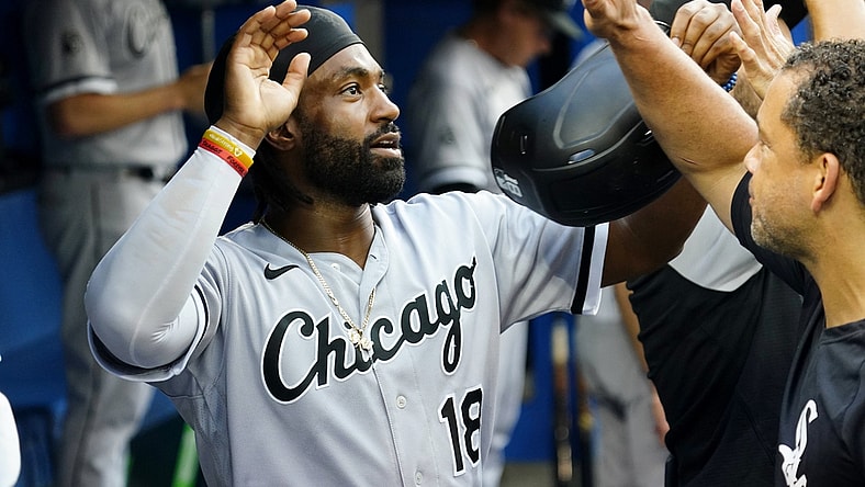 Aug 24, 2021; Toronto, Ontario, CAN; Chicago White Sox right fielder Brian Goodwin (18) celebrates scoring against the Toronto Blue Jays during the first inning at Rogers Centre. Mandatory Credit: John E. Sokolowski-USA TODAY Sports