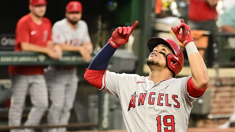 Aug 24, 2021; Baltimore, Maryland, USA; Los Angeles Angels center fielder Juan Lagares (19) reacts after hitting a two run home run against the Baltimore Orioles in the second inning  at Oriole Park at Camden Yards. Mandatory Credit: Tommy Gilligan-USA TODAY Sports