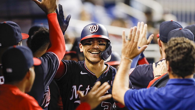 Aug 24, 2021; Miami, Florida, USA; Washington Nationals catcher Tres Barrera (38) celebrates with teammates after hitting a home run against the Miami Marlins during the fourth inning at loanDepot Park. Mandatory Credit: Sam Navarro-USA TODAY Sports
