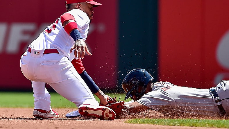 Aug 25, 2021; St. Louis, Missouri, USA;  St. Louis Cardinals second baseman Edmundo Sosa (63) tags out Detroit Tigers second baseman Willi Castro (9) as he attempt to steal second during the second inning at Busch Stadium. Mandatory Credit: Jeff Curry-USA TODAY Sports