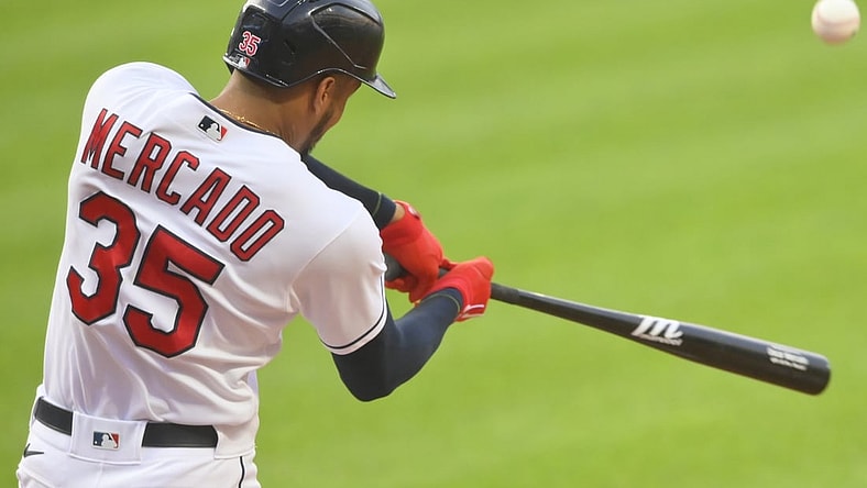 Aug 25, 2021; Cleveland, Ohio, USA; Cleveland Indians left fielder Oscar Mercado (35) hits a solo home run in the second inning against the Texas Rangers at Progressive Field. Mandatory Credit: David Richard-USA TODAY Sports