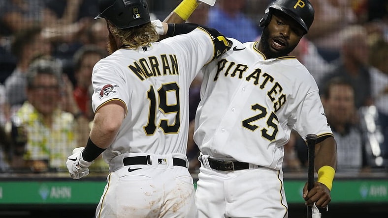 Aug 26, 2021; Pittsburgh, Pennsylvania, USA;  Pittsburgh Pirates first baseman Colin Moran (19) celebrates with right fielder Gregory Polanco (25) after hitting a two run home run against the St. Louis Cardinals during the third inning at PNC Park. Mandatory Credit: Charles LeClaire-USA TODAY Sports