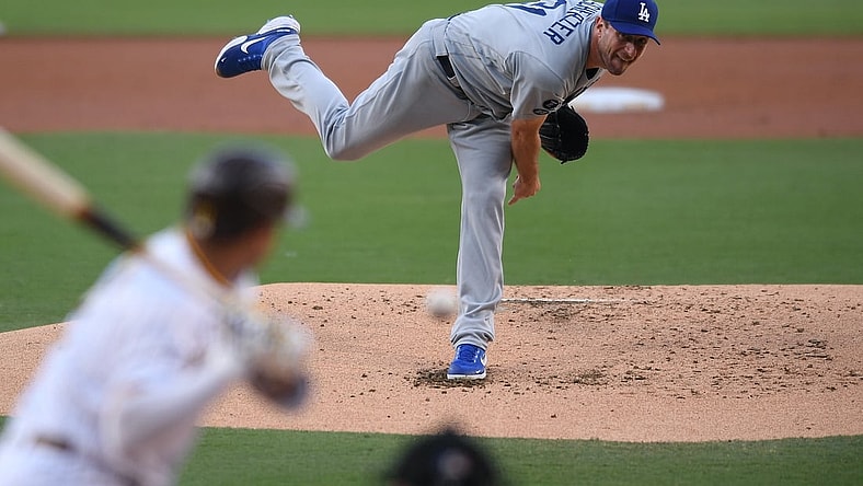 Aug 26, 2021; San Diego, California, USA; Los Angeles Dodgers starting pitcher Max Scherzer (31) throws a pitch against the San Diego Padres during the first inning at Petco Park. Mandatory Credit: Orlando Ramirez-USA TODAY Sports