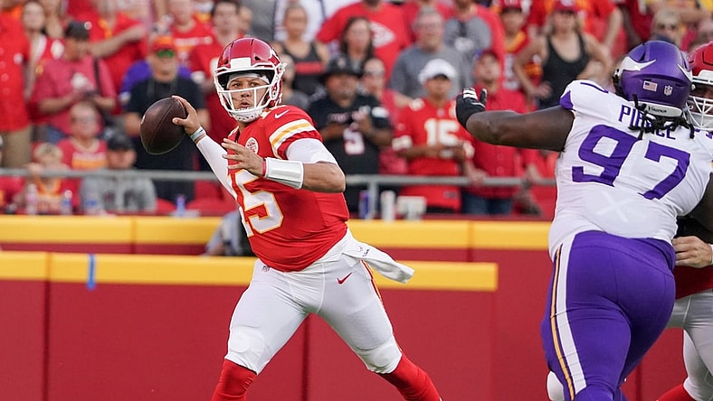 Aug 27, 2021; Kansas City, Missouri, USA; Kansas City Chiefs quarterback Patrick Mahomes (15) throws a pass against then Minnesota Vikings during the first quarter at GEHA Field at Arrowhead Stadium. Mandatory Credit: Denny Medley-USA TODAY Sports
