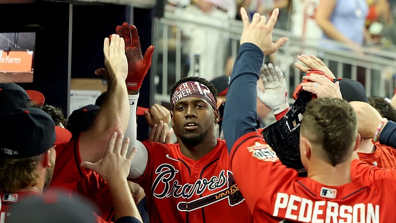 Aug 27, 2021; Atlanta, Georgia, USA; Atlanta Braves outfielder Jorge Soler (12) celebrates his three-run home run during the seventh inning against the San Francisco Giants at Truist Park. Mandatory Credit: Jason Getz-USA TODAY Sports