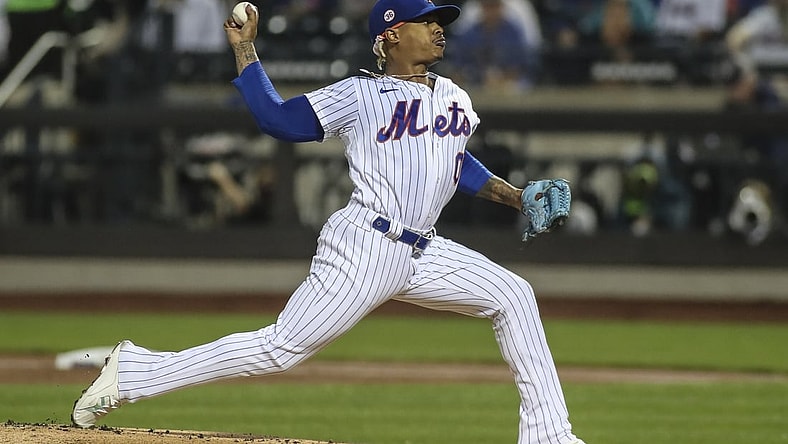 Aug 28, 2021; New York City, New York, USA;  New York Mets pitcher Marcus Stroman (0) pitches in the first inning against the Washington Nationals at Citi Field. Mandatory Credit: Wendell Cruz-USA TODAY Sports