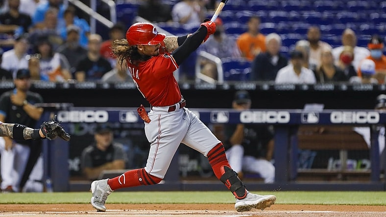 Aug 29, 2021; Miami, Florida, USA; Cincinnati Reds third baseman Jonathan India (6) connects for a base hit against the Miami Marlins during the first inning at loanDepot Park. Mandatory Credit: Sam Navarro-USA TODAY Sports