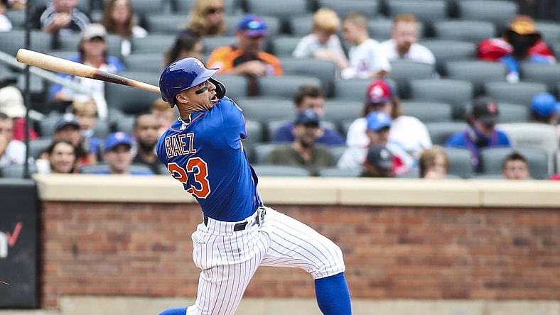 Aug 29, 2021; New York City, New York, USA;  New York Mets second baseman Javier Baez (23) hits a two run home run in the fourth inning against the Washington Nationals at Citi Field. Mandatory Credit: Wendell Cruz-USA TODAY Sports