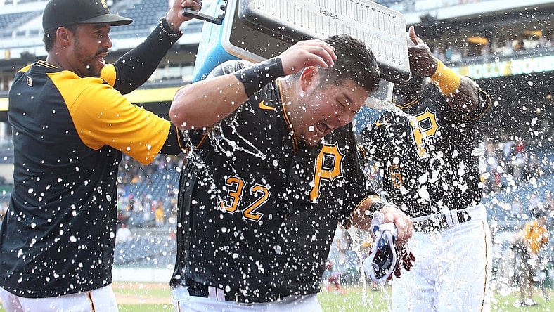 Aug 29, 2021; Pittsburgh, Pennsylvania, USA;  Pittsburgh Pirates relief pitcher Duane Underwood Jr. (left) and left fielder Anthony Alford (right) dump ice water on right fielder Yoshi Tsutsugo (32) after Tsuitsugo hit a game winning walk-off three run home run to defeat the St. Louis Cardinals at PNC Park. The Pirates won 4-3. Mandatory Credit: Charles LeClaire-USA TODAY Sports
