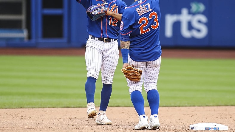 Aug 29, 2021; New York City, New York, USA; New York Mets shortstop Francisco Lindor (12) and second baseman Javier Baez (23) celebrate after defeating the Washington Nationals 9-4 at Citi Field. Mandatory Credit: Wendell Cruz-USA TODAY Sports