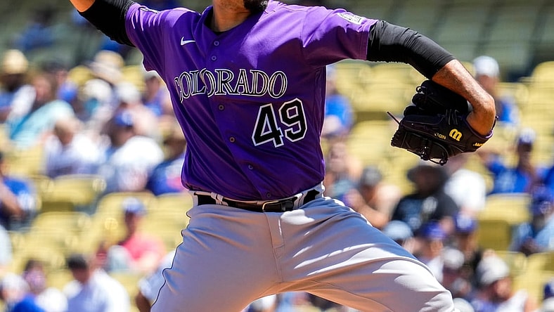 Aug 29, 2021; Los Angeles, California, USA; Colorado Rockies starting pitcher Antonio Senzatela (49) throws a pitch in the first inning against the Los Angeles Dodgers at Dodger Stadium. Mandatory Credit: Robert Hanashiro-USA TODAY Sports