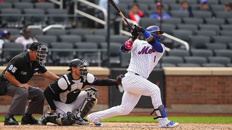 Aug 31, 2021; New York City, New York, USA; New York Mets third baseman Jonathan Villar (1) hits a home run during the fifth inning against the Miami Marlins at Citi Field. Mandatory Credit: Gregory Fisher-USA TODAY Sports