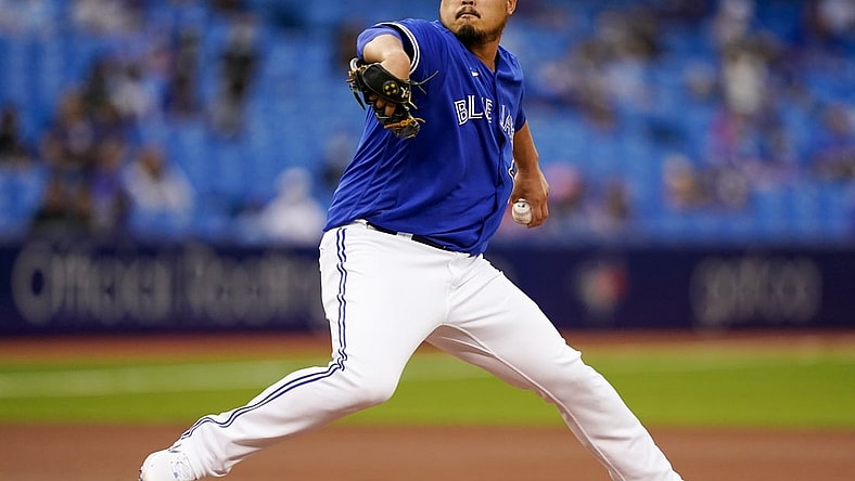 Aug 31, 2021; Toronto, Ontario, CAN; Toronto Blue Jays starting pitcher Hyun Jin Ryu (99) pitches against the Baltimore Orioles during the first inning at Rogers Centre. Mandatory Credit: Kevin Sousa-USA TODAY Sports