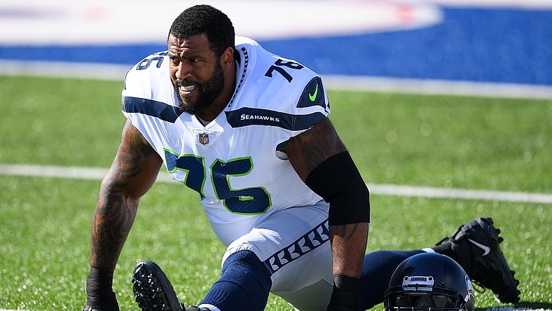Nov 8, 2020; Orchard Park, New York, USA; Seattle Seahawks offensive tackle Duane Brown (76) stretches prior to the game against the Buffalo Bills at Bills Stadium. Mandatory Credit: Rich Barnes-USA TODAY Sports