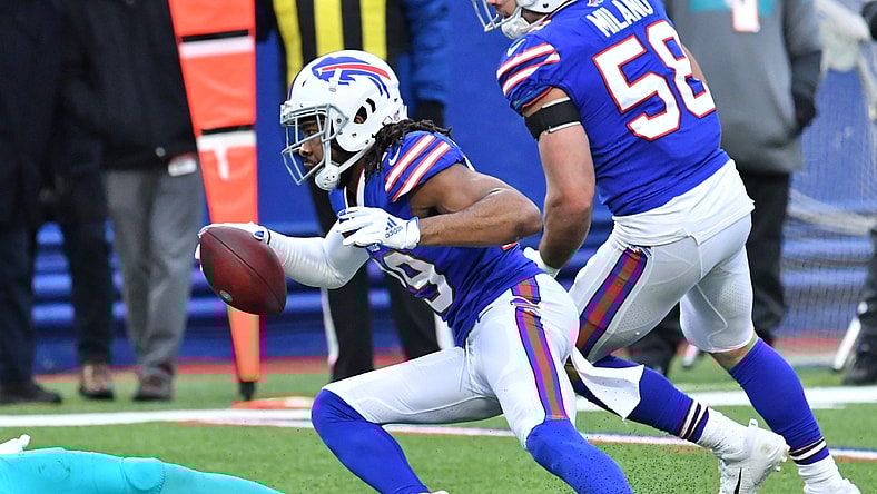 Jan 3, 2021; Orchard Park, New York, USA; Buffalo Bills cornerback Josh Norman (29) returns an interception against the Miami Dolphins in the third quarter at Bills Stadium. Mandatory Credit: Mark Konezny-USA TODAY Sports