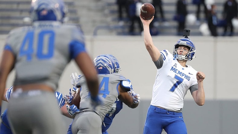 Memphis Tigers quarterback Grant Gunnell throws the ball during their Friday Night Stripes spring game at the Liberty Bowl Memorial Stadium on Friday, April 16, 2021.

A11i1727