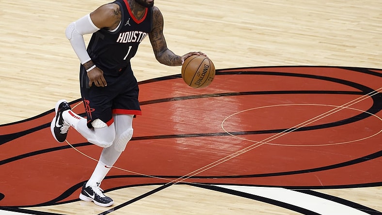 Apr 19, 2021; Miami, Florida, USA;  Houston Rockets guard John Wall (1) bring the ball up court against the Miami Heat at American Airlines Arena. Mandatory Credit: Rhona Wise-USA TODAY Sports