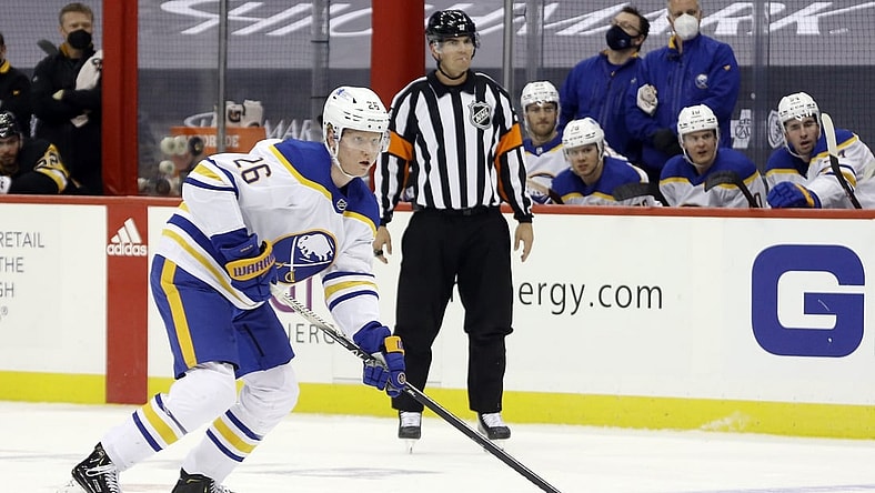 May 6, 2021; Pittsburgh, Pennsylvania, USA;  Buffalo Sabres defenseman Rasmus Dahlin (26) handles the puck against the Pittsburgh Penguins during the second period at PPG Paints Arena. Mandatory Credit: Charles LeClaire-USA TODAY Sports