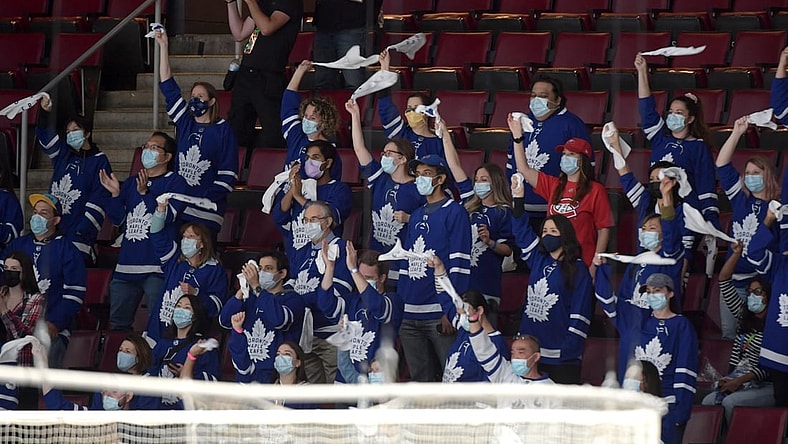 May 31, 2021; Toronto, Ontario, CAN; Health care workers cheer for their team after being given free seats to watch the Montreal Canadiens and Toronto Maple Leafs play game seven of the first round of the 2021 Stanley Cup Playoffs at Scotiabank Arena. Mandatory Credit: Dan Hamilton-USA TODAY Sports