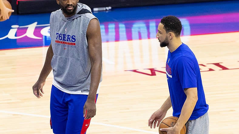 Jun 2, 2021; Philadelphia, Pennsylvania, USA; Philadelphia 76ers center Joel Embiid (L) talks with guard Ben Simmons (R) before game five in the first round of the 2021 NBA Playoffs against the Washington Wizards at Wells Fargo Center. Mandatory Credit: Bill Streicher-USA TODAY Sports