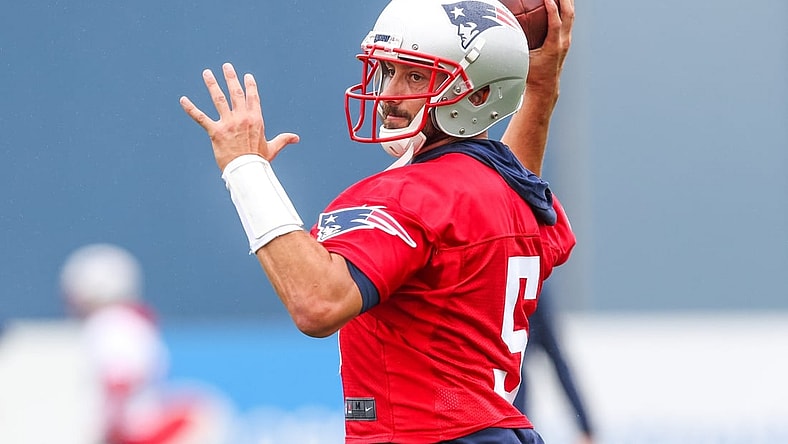 Jul 28, 2021; Foxborough, MA, United States; New England Patriots quarterback Brian Hoyer (5) during training camp at Gillette Stadium. Mandatory Credit: Paul Rutherford-USA TODAY Sports