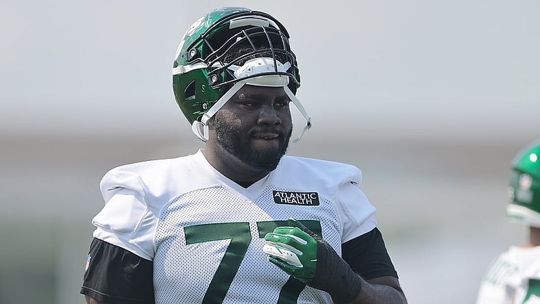 Jul 28, 2021; Florham Park, NJ, United States; New York Jets offensive tackle Mekhi Becton (77) looks on during training camp at Atlantic Health Jets Training Center. Mandatory Credit: Vincent Carchietta-USA TODAY Sports