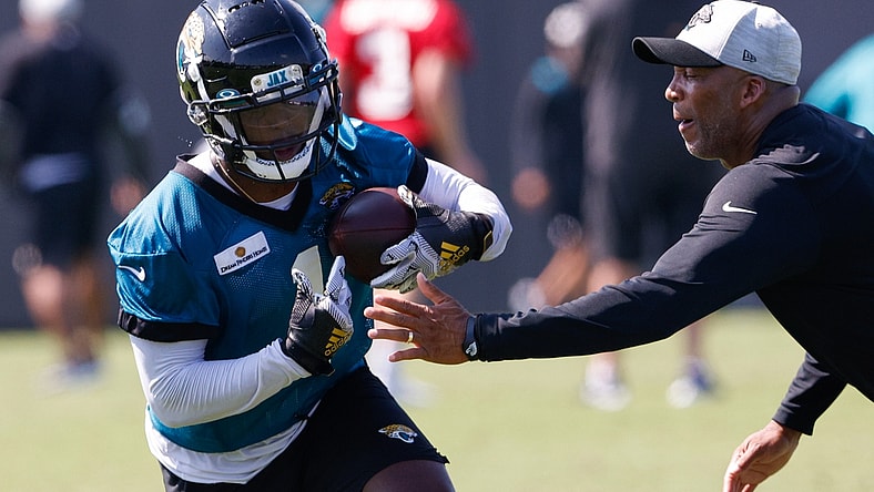 Jul 29, 2021; Jacksonville, FL, USA;  Jacksonville Jaguars running back Travis Etienne (1) participates in training camp at Dream Finders Homes practice field Mandatory Credit: Nathan Ray Seebeck-USA TODAY Sports