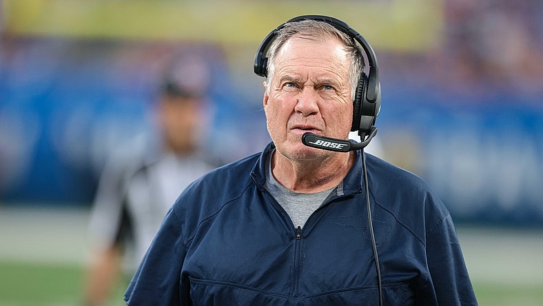Aug 29, 2021; East Rutherford, New Jersey, USA; New England Patriots head coach Bill Belichick looks up during the first half against the New York Giants at MetLife Stadium. Mandatory Credit: Vincent Carchietta-USA TODAY Sports