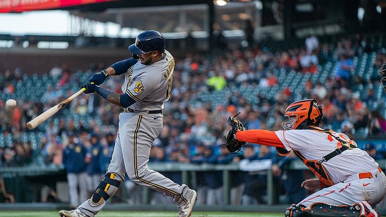 Sep 3, 2021; San Francisco, California, USA;  Milwaukee Brewers catcher Omar Narvaez (10) hits a RBI single against the San Francisco Giants during the first inning at Oracle Park. Mandatory Credit: Neville E. Guard-USA TODAY Sports